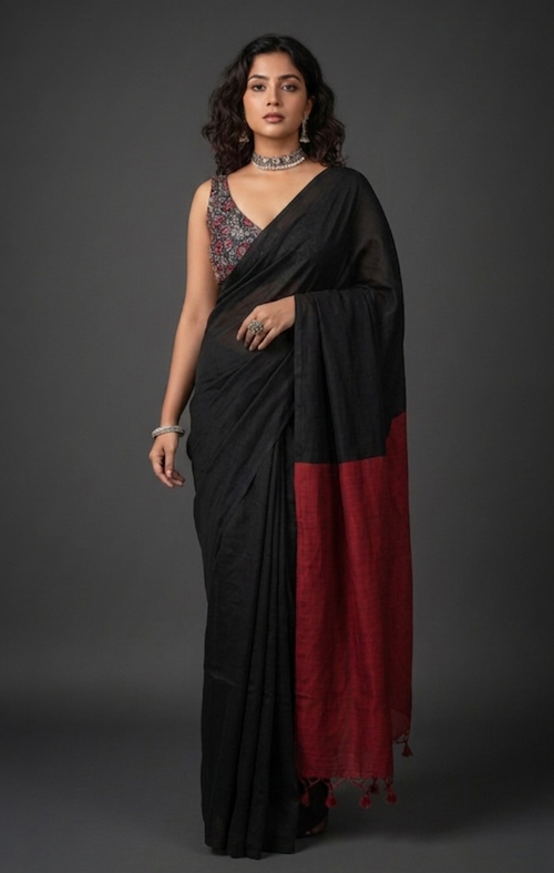 Woman wearing a black and red saree